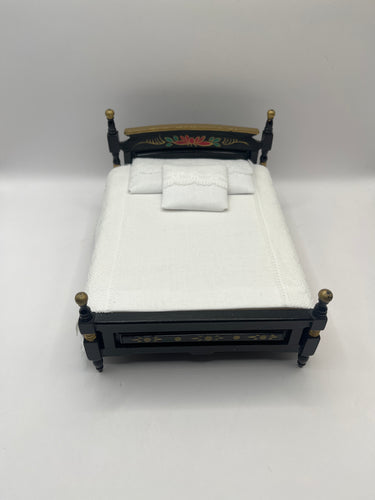 AB022 - Black and gold double bed with white bedding