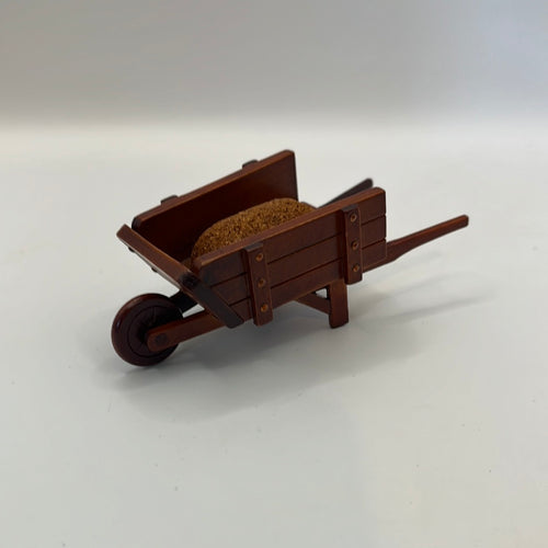 ACC644 - Filled wooden wheelbarrow
