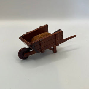 ACC644 - Filled wooden wheelbarrow