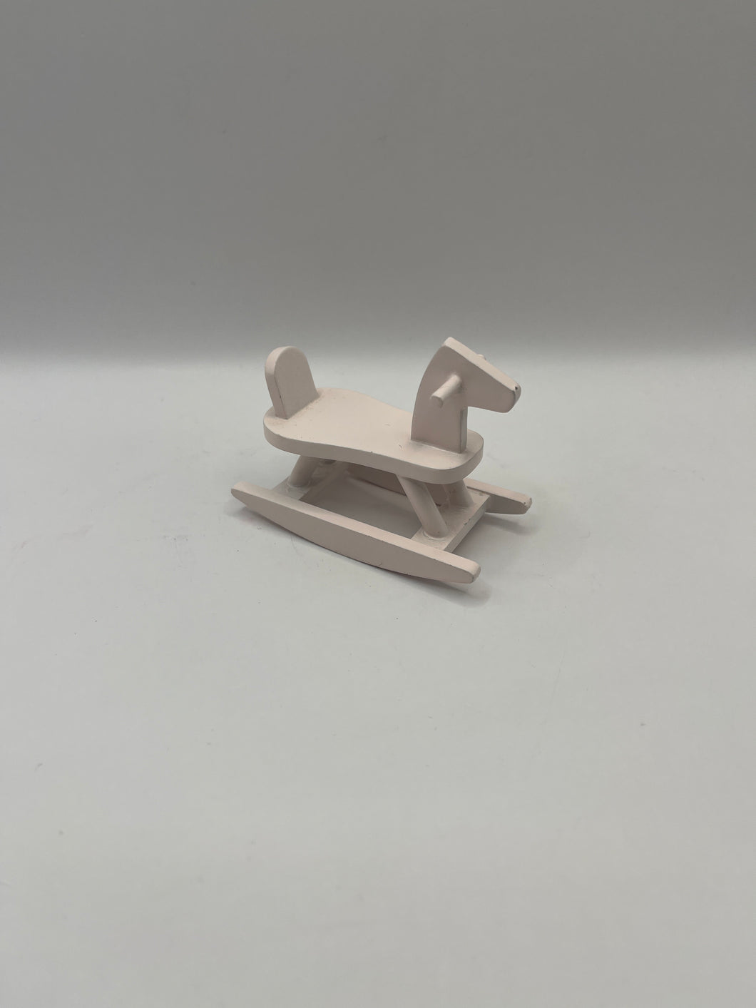 NUR013 - Pale pink rocking horse