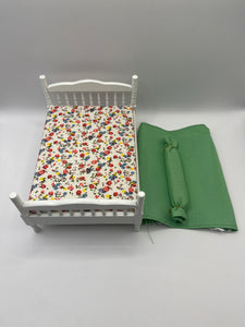 AB061 - White double bed with green bedding