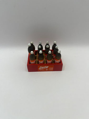 D1243 - Bottles of cola in crate