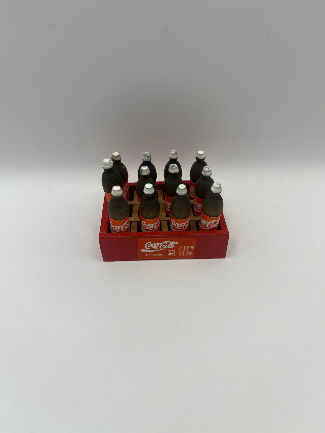 D1243 - Bottles of cola in crate