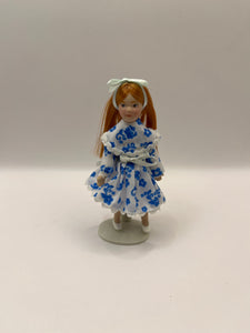 DOL064 - Girl in blue and white dress