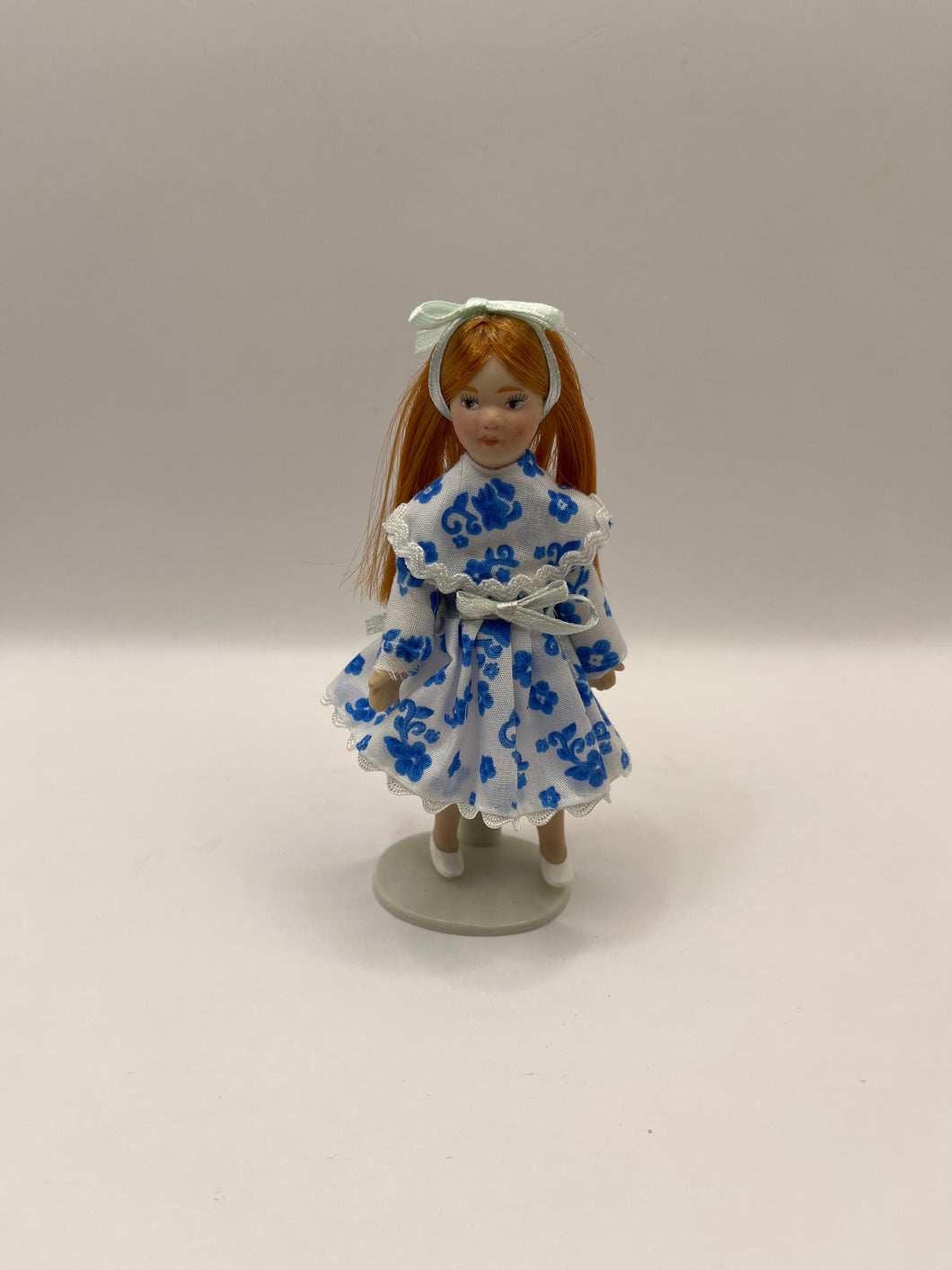 DOL064 - Girl in blue and white dress