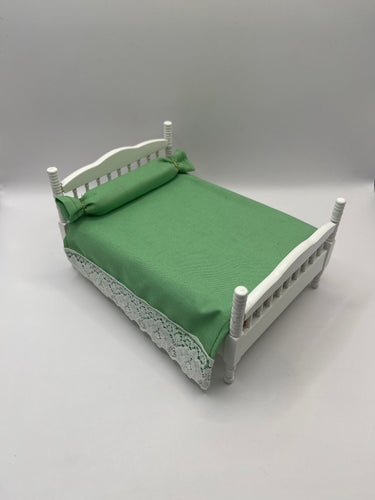 AB061 - White double bed with green bedding