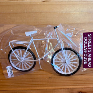 OUT043 - White bicycle